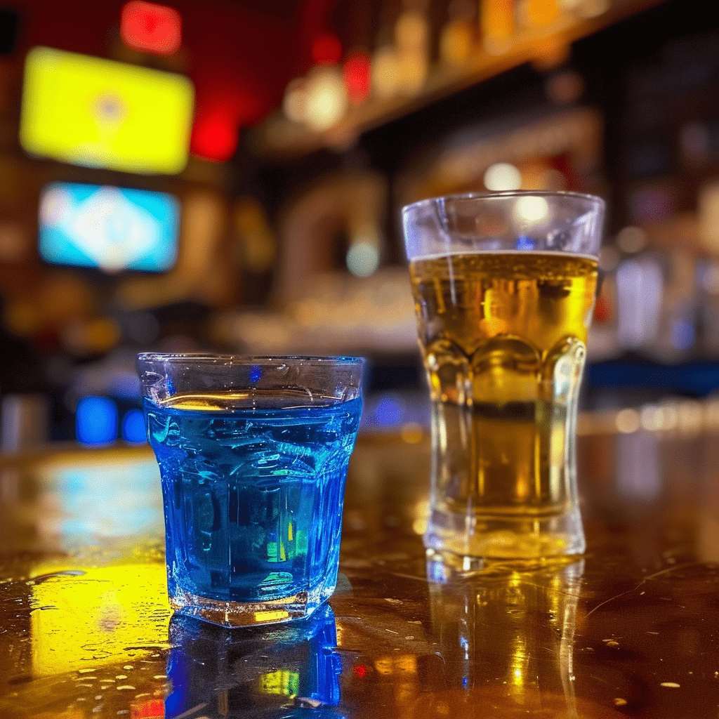 Spider Bite Recipe - The Spider Bite shot is a potent concoction that delivers a sweet and citrusy flavor from the blue tequila, followed by the tart and slightly sweet taste of Red Bull. It's a strong, energizing shot with a unique flavor profile.